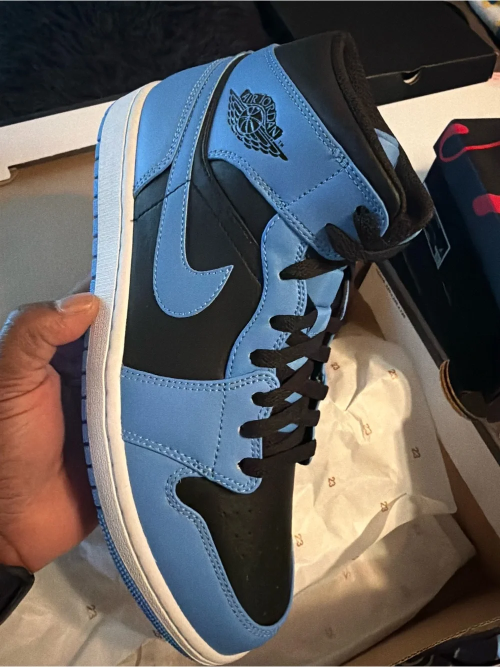 Jordan 1 Mid - Black and University Blue